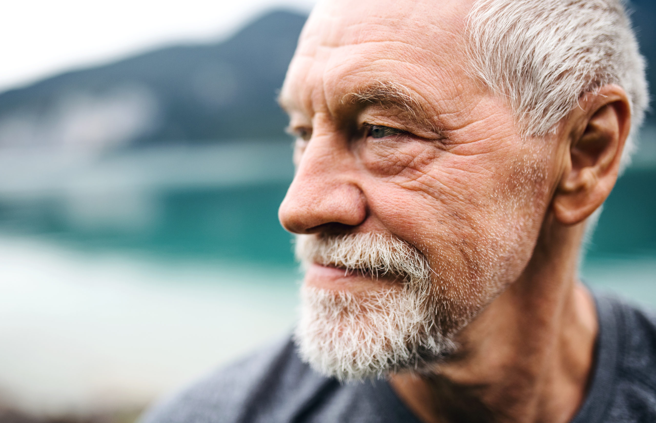 men's mental health image - man by the water